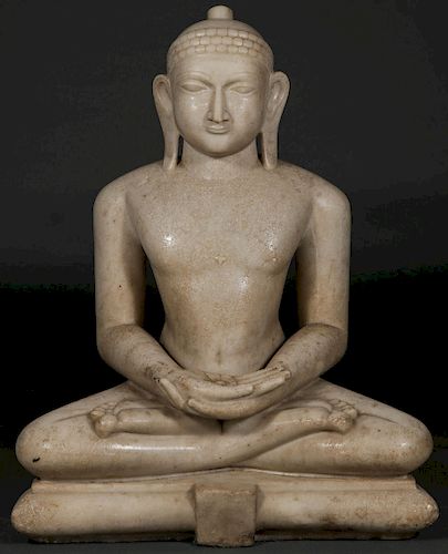 A LARGE AND IMPOSING CARVED MARBLE BUDDHA