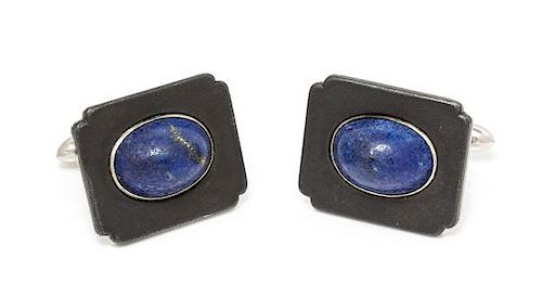 * A Pair of Art Moderne Blackened Steel, White Gold and Lapis Lazuli Cufflinks, Marsh & Co., 11.25 dwts.