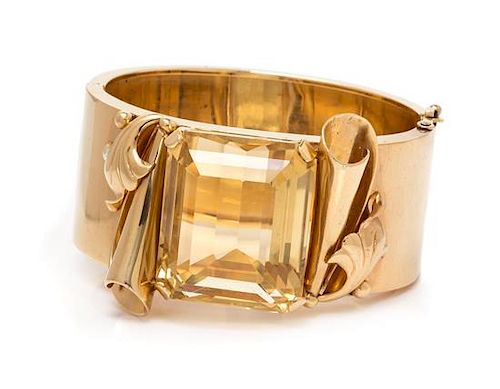 * A Retro Yellow Gold and Citrine Bangle Bracelet, 56.60 dwts.