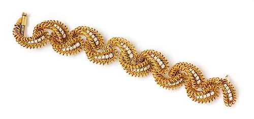 An 18 Karat Yellow Gold and Diamond Link Bracelet, Ugo Bellini, Florence, 56.90 dwts.