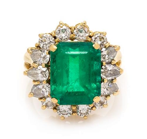 An 18 Karat Yellow Gold, Emerald and Diamond Ring, 7.60 dwts.