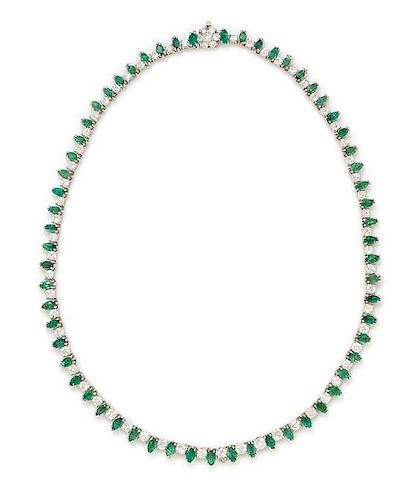 A White Gold, Diamond and Emerald Riviere Necklace, 16.70 dwts.