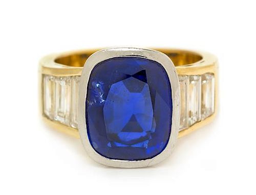A Platinum Topped 18 Karat Yellow Gold, Sapphire and Diamond Ring, 6.50 dwts.