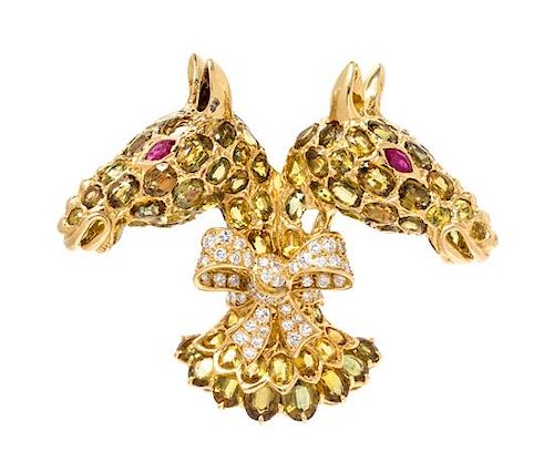 An 18 Karat Yellow Gold, Sapphire, Ruby and Diamond Twin Horse Head Brooch, Tiffany & Co., 30.90 dwts.