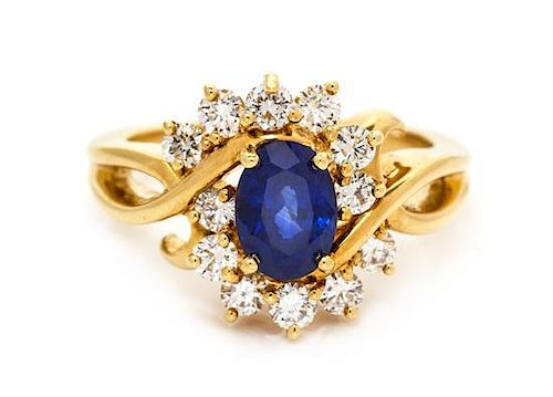 An 18 Karat Yellow Gold, Sapphire and Diamond Ring, 6.25 dwts.