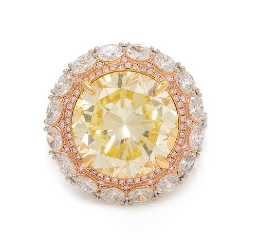 An 18 Karat Tricolor Gold, Fancy Yellow Diamond, Diamond and Colored Diamond Ring, 10.10 dwts.