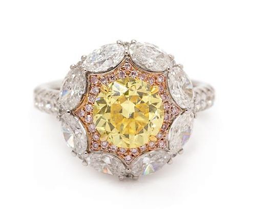 An 18 Karat Tricolor Gold, Fancy Vivid Yellow Diamond, Diamond and Colored Diamond Ring, 4.90 dwts.