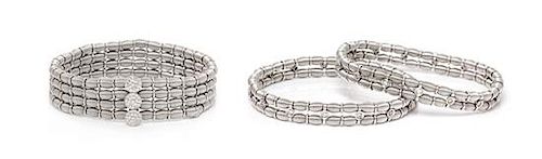 A Collection of White Gold and Diamond Flexible Bracelets, Jarretiere, 42.35 dwts.