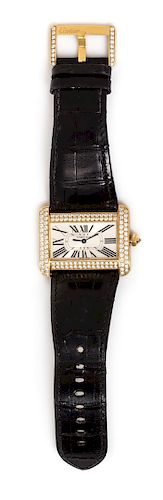 * An 18 Karat Yellow Gold and Diamond Ref. 2602 'Tank Divan XL' Wristwatch, Cartier,