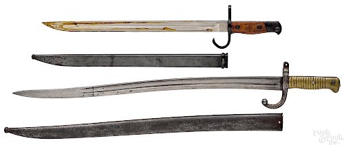 Two bayonets with scabbards