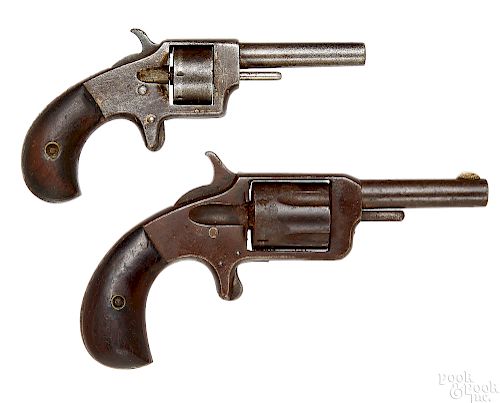 Two spur trigger revolvers