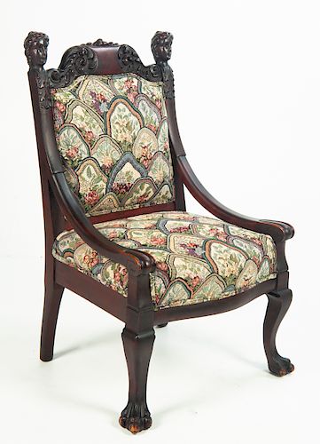 Mahogany Arm Chair with Carved Heads