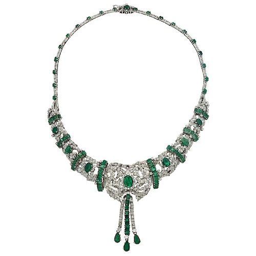 An emerald and diamond palladium silver choker. 