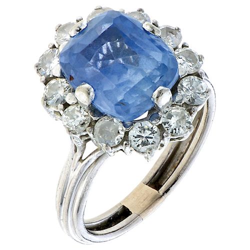 A sapphire and diamond palladium silver ring. 