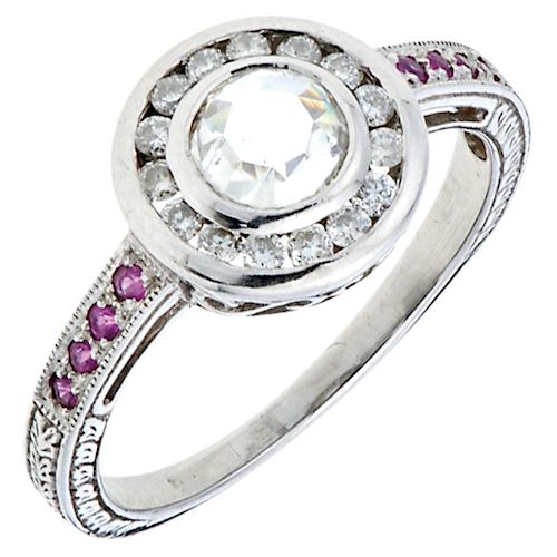 A diamond and ruby 14K white gold ring.