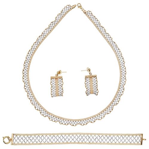 A 14K yellow and white gold choker, bracelet and pair of earrings set.