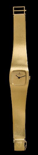* An 18 Karat Yellow Gold Wristwatch, Baume & Mercier,