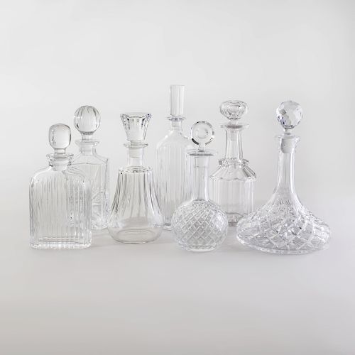 Two Baccarat Glass Decanters and Stoppers, and Five Glass Decanters and Stoppers