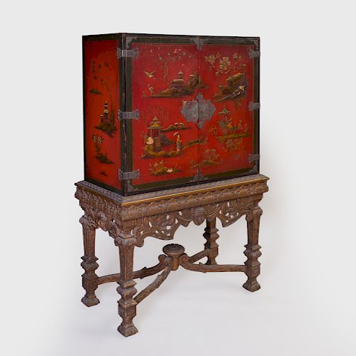 Chinese Export Style Metal-Mounted Red Lacquer and Parcel-Gilt Cabinet on a Continental Carved Wood Stand