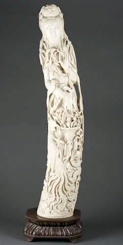 A large Chinese carved ivory figure of Lan Caihe.
