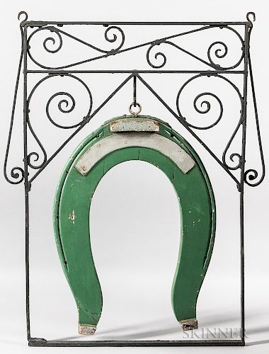 Wrought Iron and Carved and Green-painted Wood Farrier's Trade Sign