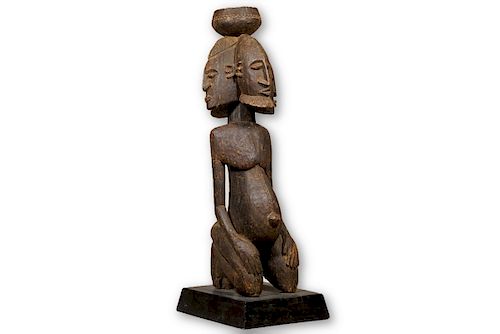Large Kneeling 4-Faced Dogon Figure with Base from Mali