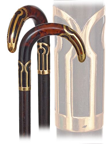 34. Tortoiseshell and Gold Cane -Ca. 1910 -Solid tortoiseshell crook handle with matching and wide yellow gold cap and collar, well streaked makassar 