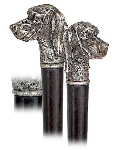 87. Silver Dog Head Cane -Ca. 1890 -Well modeled, heavily cast and finely hand chased sizeable dog head knob, ebony shaft and a brass ferrule. Excepti