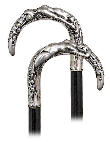 90. Figural Art Nouveau Cane -Ca. 1900 -Well-proportioned crook silver-plated handle with a reclining nude emerging from a bunch of lilies of the vall