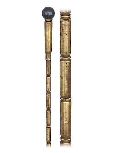 113. Keepsake Military Cane -20th Century -Fashioned of brass cartridge hulls piled on a steel core with iron ferrule. Where the shaft is made of 17 i