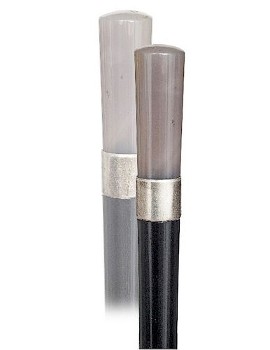 159. Agate Dress Cane  -Early 20th Century -The polished Milord handle of a natural gray color and subtle foggy structure, ebony shaft with a plain si