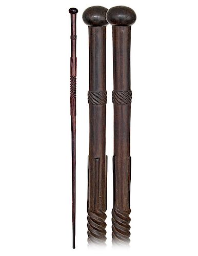 198. Afro-Colonial Cane -Ca. 1900 -Single piece iron wood cane with an integral knob and four twisted rods carving. Character and personality are the 