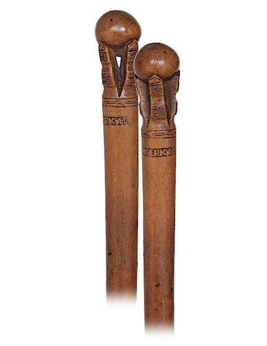 200. Folk Art Cane -19thCentury -Fashioned of one sturdy olive tree branch freed from its bark and carved with an integral knob in the stylized shape 