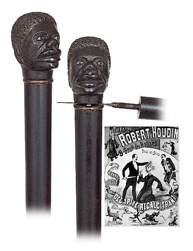 7. Ebony Head Chopper Cane -Ca. 1890 -Well carved ebony Black Man’s head with an elongated face showing the characteristic wide and flat nose and larg