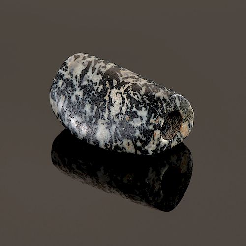 A Black and White Granite Humped Bannerstone, 2-1/4 in.
