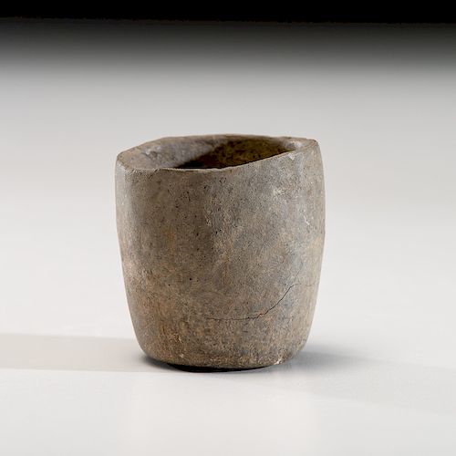 An Archaic Limestone Cup, 2 in.