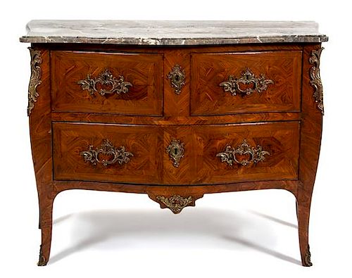 A Louis XV Style Gilt Bronze Mounted Tulipwood Commode Height 32 x width 43 x depth 21 1/2 inches.
