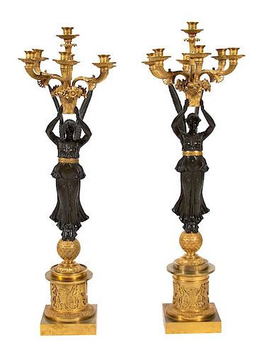 A Pair of Large Empire Gilt and Patinated Bronze Candelabra Height 36 1/2 inches.