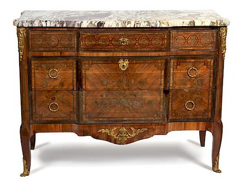 A Louis XV/XVI Transitional Style Gilt Bronze Mounted Marquetry Commode Height 37 x width 49 x depth 21 inches.