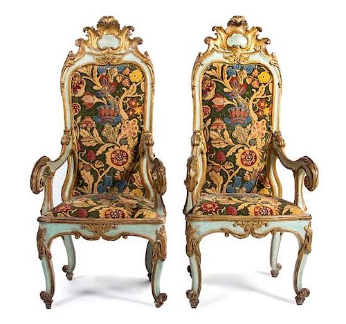 A Pair of Venetian Painted and Gilt Armchairs Height 58 inches.
