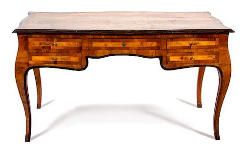 An Italian Parcel Ebonized Walnut Writing Table Height 32 1/2 x width 59 x depth 33 1/4 inches.