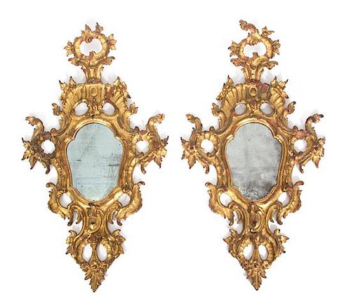 A Pair of Venetian Carved Giltwood Mirrors Height 33 1/4 inches.