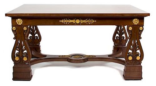 An Italian Neoclassical Style Mahogany Library Table Height 29 1/2 x width 59 x depth 39 1/4 inches.