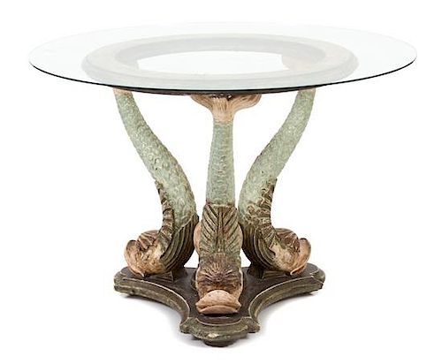 A Continental Carved and Polychromed Wood Dolphin Base Glass Top Table Height 30 1/2 x diameter 31, glass top diameter 44 inches