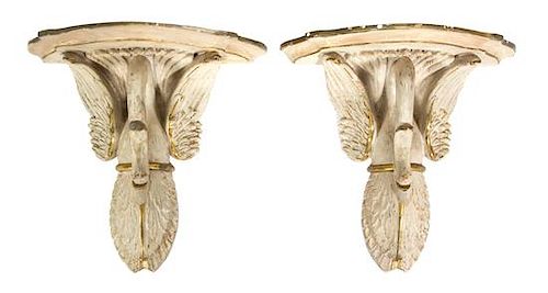 A Pair of Swedish Painted and Parcel Gilt Terracotta Swan-form Brackets Height 12 inches.