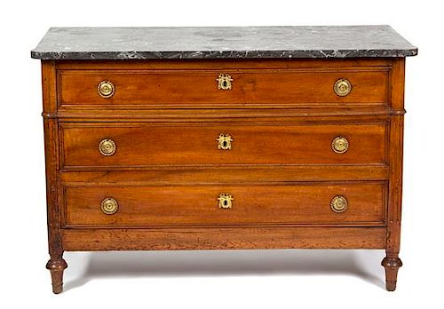 A Louis XVI Style Marble Top Fruitwood Commode Height 33 3/4 x width 50 x depth 22 3/4 inches.
