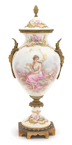 A Sevres Style Gilt Bronze Mounted Porcelain Urn Height 15 1/2 inches.