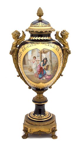 A Sevres Style Gilt Bronze Mounted Porcelain Urn Height 31 inches.