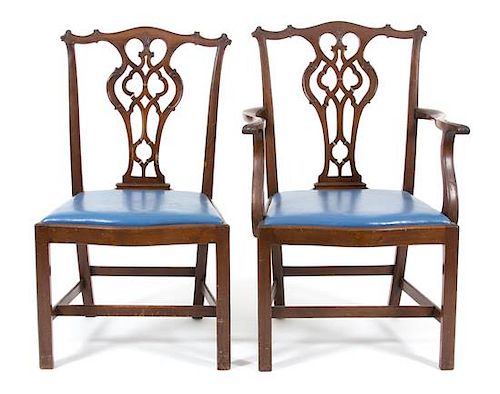 A Set of Eight Chippendale Style Carved Mahogany Dining Chairs Height 39 inches.