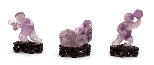 Three Chinese Carved Amethyst Figures of Boys Height of tallest figure 3 3/4 inches.